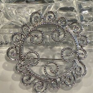 Ornate Silver Scroll Medallion Brooch
